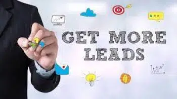 A person in a business suit writes on a transparent board with the text GET MORE LEADS, surrounded by icons: a target, chat bubbles, a lightbulb, a graph, an envelope, and clouds. This strategic setup aims to generate more leads effectively.