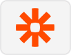 Orange asterisk-like symbol with rounded edges and a square center, displayed on a light gray rounded rectangle background.