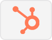 An orange HubSpot logo with three lines and circles radiating from a central ring, on a light gray rounded rectangle background.